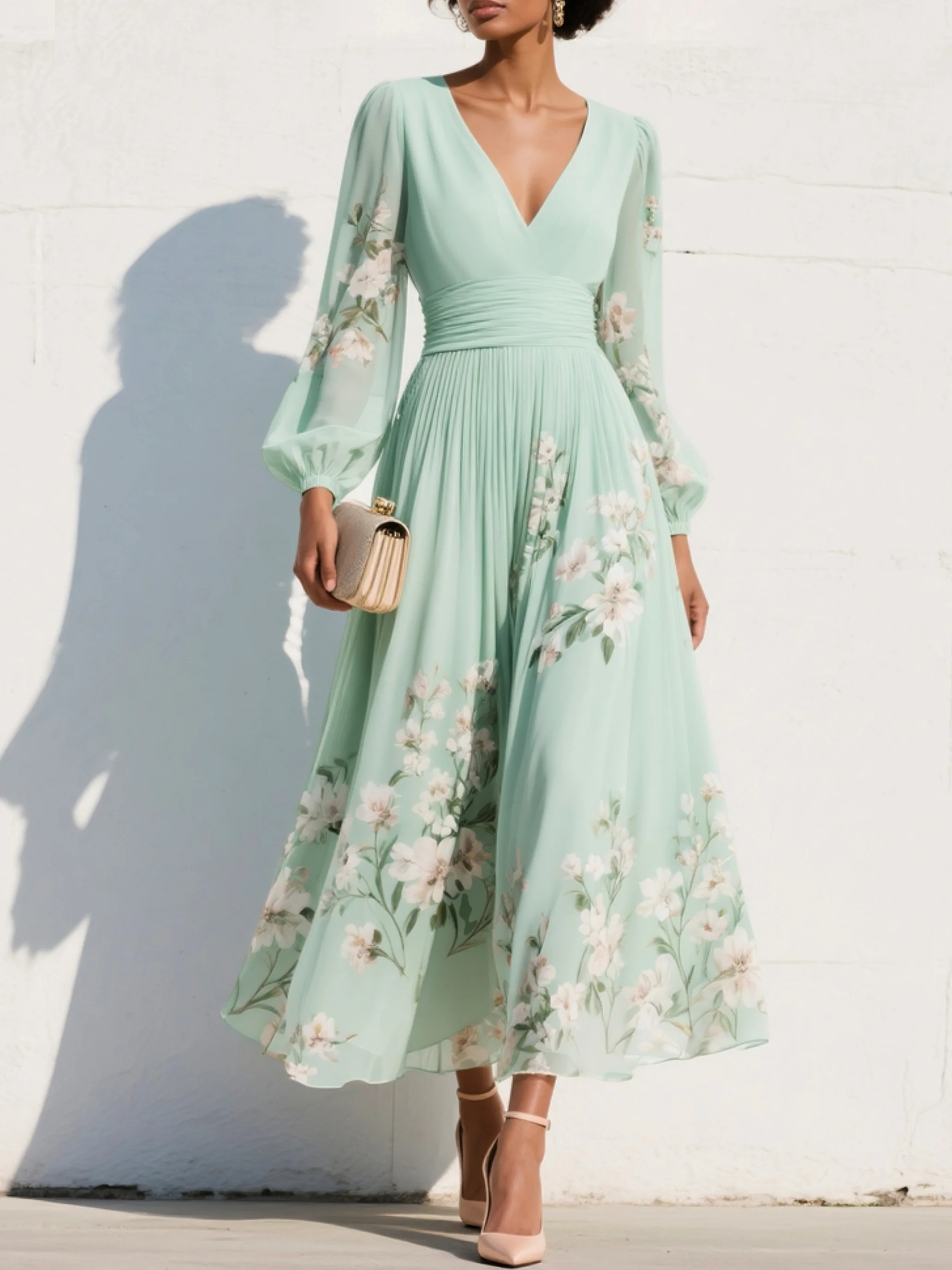 Vestido maxi plisado de chifón verde menta con estampado floral