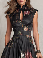 Violetta - Vestido midi negro de satén plisado con motivo floral y cuello con foro a forma de chiave