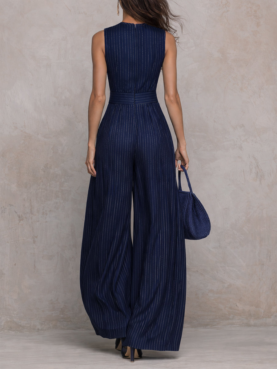 Anna - Tuta azul scuro de rayas con escote con abertura y pantalones de pierna ancha