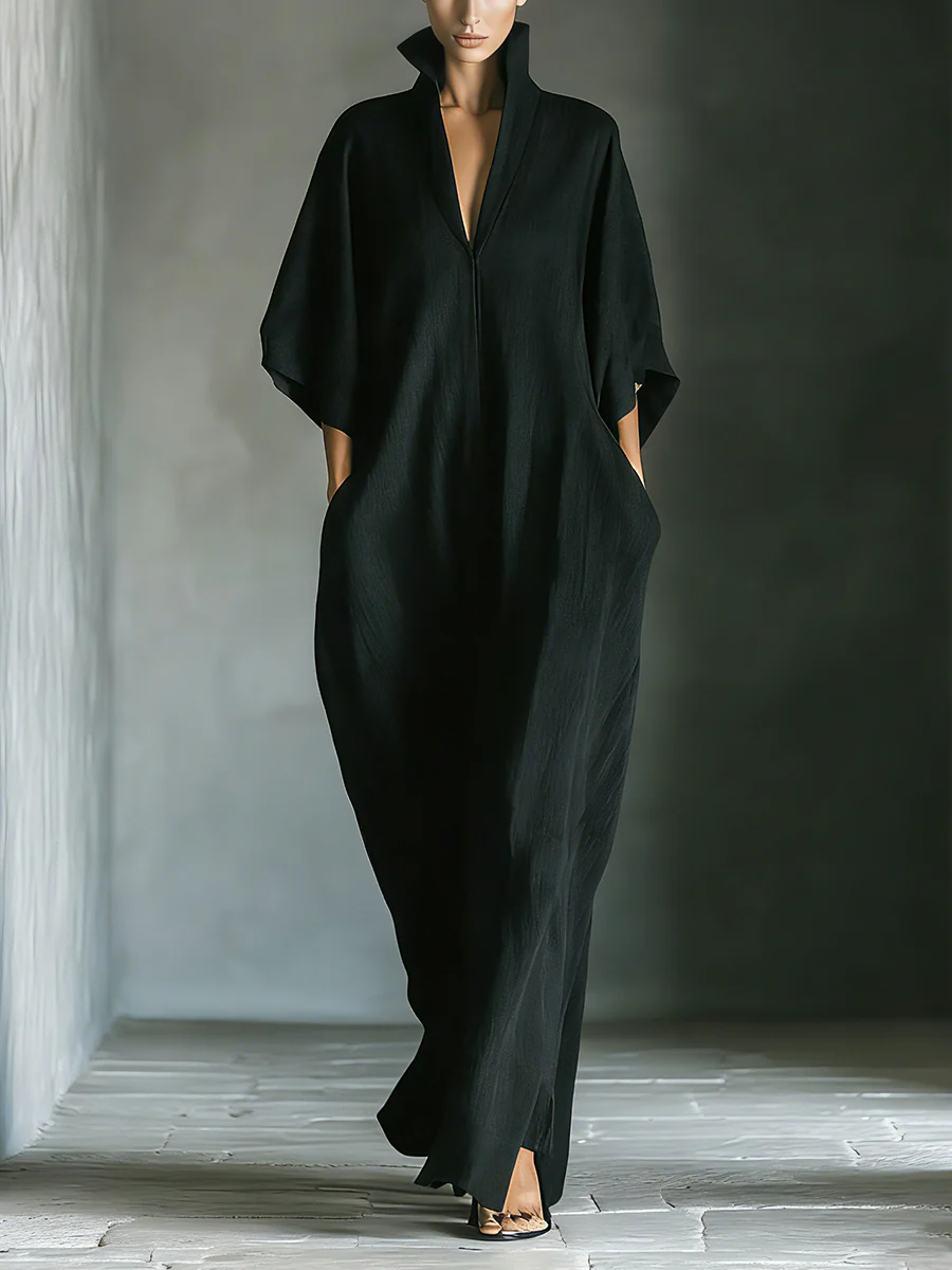 Alessandra™ | Vestido largo negro oversize minimalista con mangas a kimono