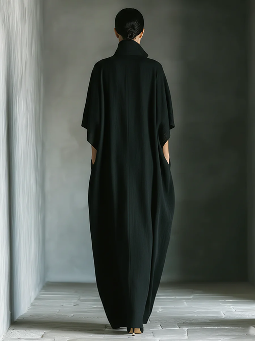 Alessandra™ | Vestido largo negro oversize minimalista con mangas a kimono