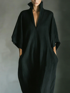 Alessandra™ | Vestido largo negro oversize minimalista con mangas a kimono