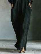 Alessandra™ | Vestido largo negro oversize minimalista con mangas a kimono