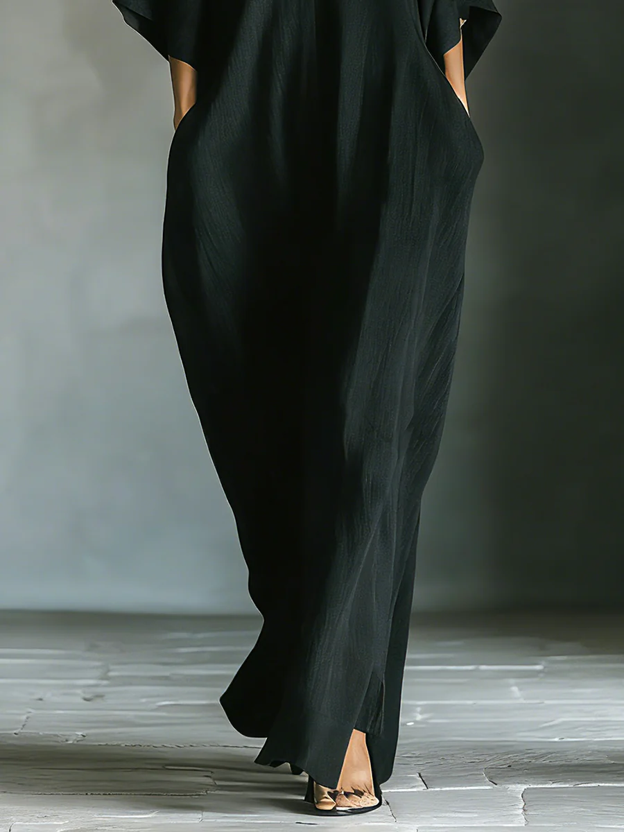 Alessandra™ | Vestido largo negro oversize minimalista con mangas a kimono