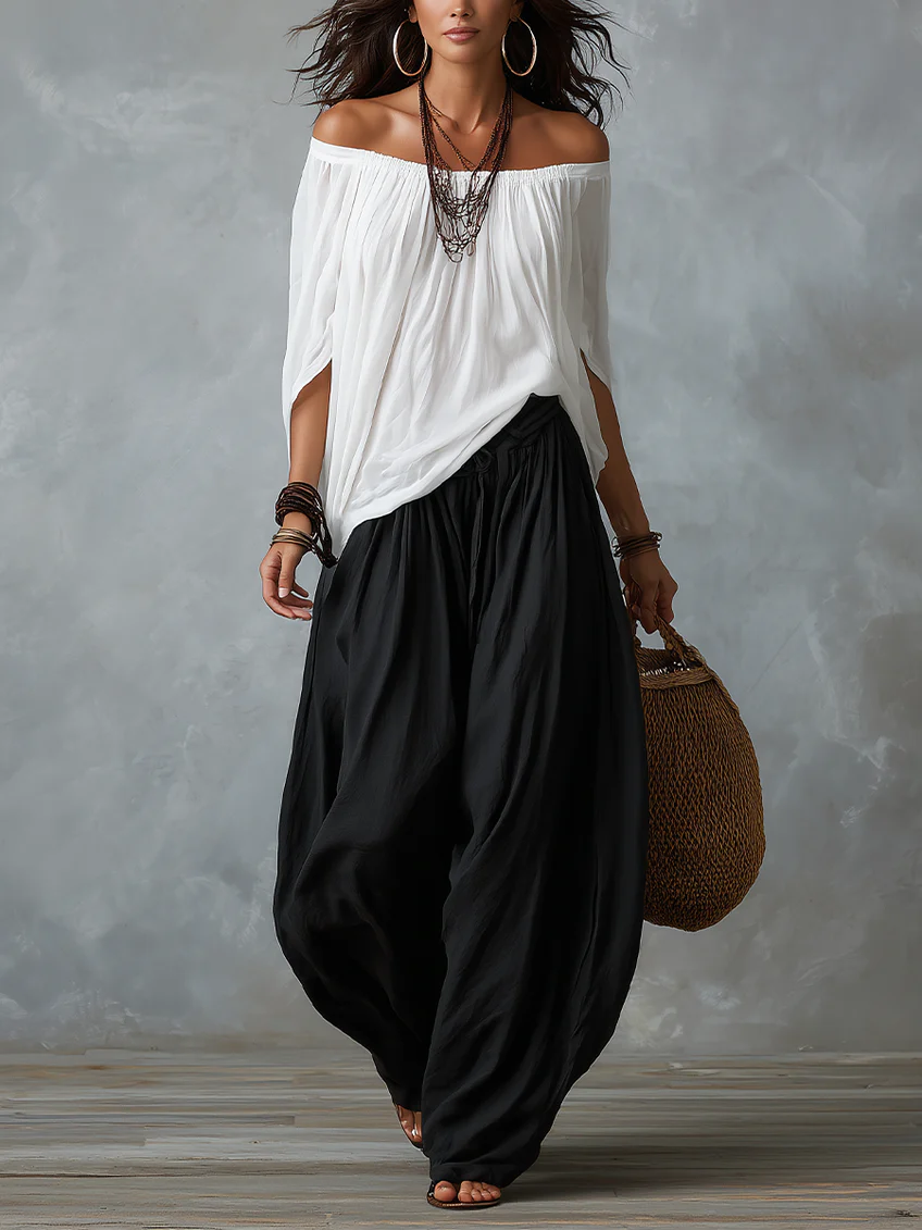 Conjunto de Top Blanco con Hombros Descubiertos y Pantalones Anchos