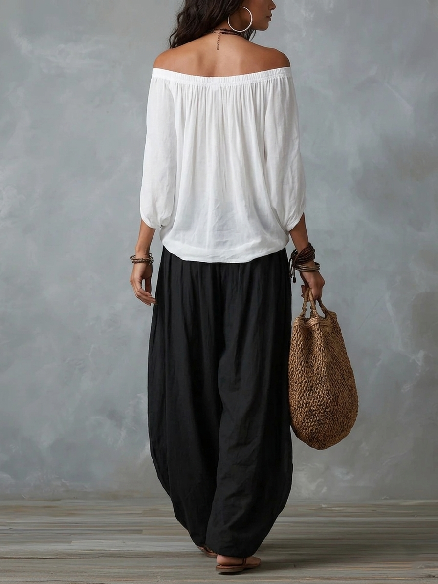 Conjunto de Top Blanco con Hombros Descubiertos y Pantalones Anchos
