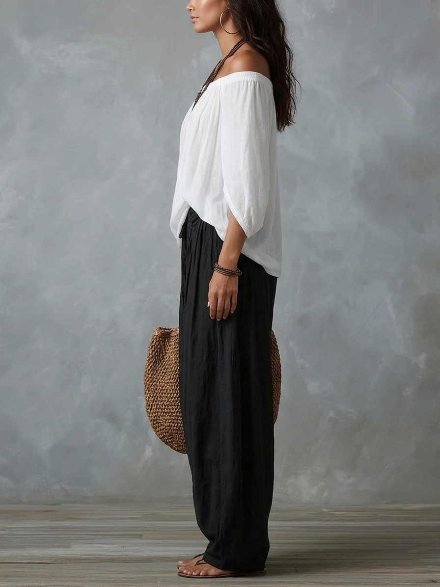 Conjunto de Top Blanco con Hombros Descubiertos y Pantalones Anchos