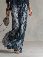 Ludovica - elegante de chifón con top a cuello alto y pantalones anchos eestampadodos